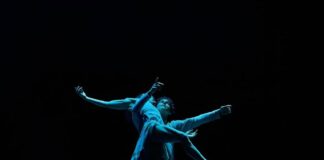 two ballet dancers in the dark