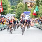 Cyclist Isaac del Toro crosses the finish line at a race in Austria