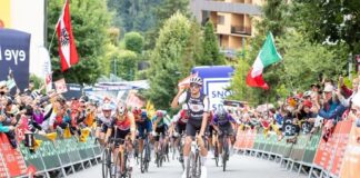 Cyclist Isaac del Toro crosses the finish line at a race in Austria