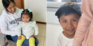 Two children, patients of Kids First Orthopaedics, smile at the camera. One little girl has casts on both legs. The other, a little boy, hides behind his mother