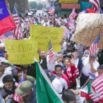 Street protest with US flags