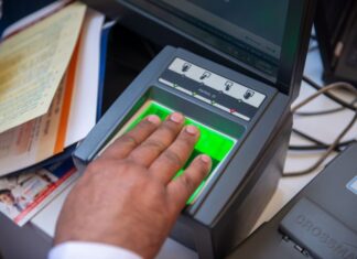 a person registering their fingerprints