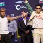Jake Paul points at boxer Julio César Chávez Jr