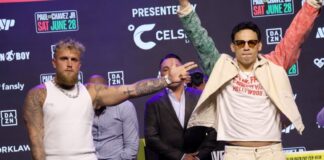 Jake Paul points at boxer Julio César Chávez Jr