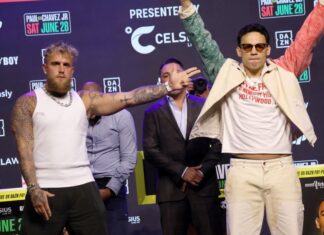 Jake Paul points at boxer Julio César Chávez Jr