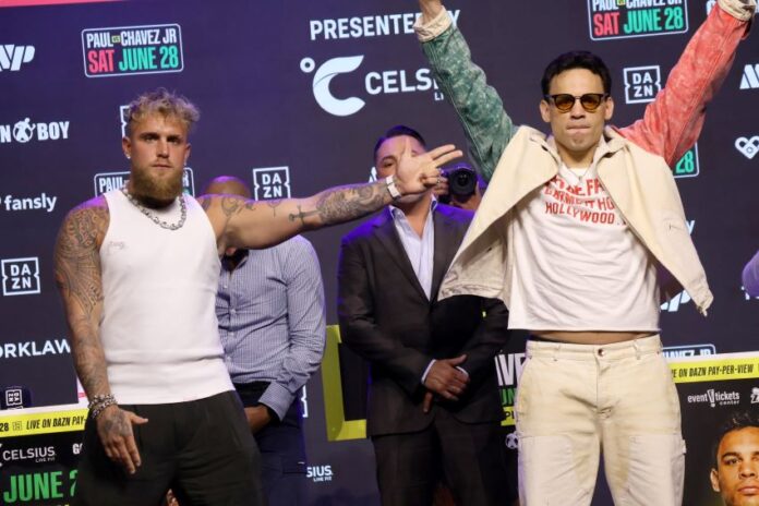 Jake Paul points at boxer Julio César Chávez Jr