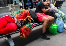 passengers waiting at airport