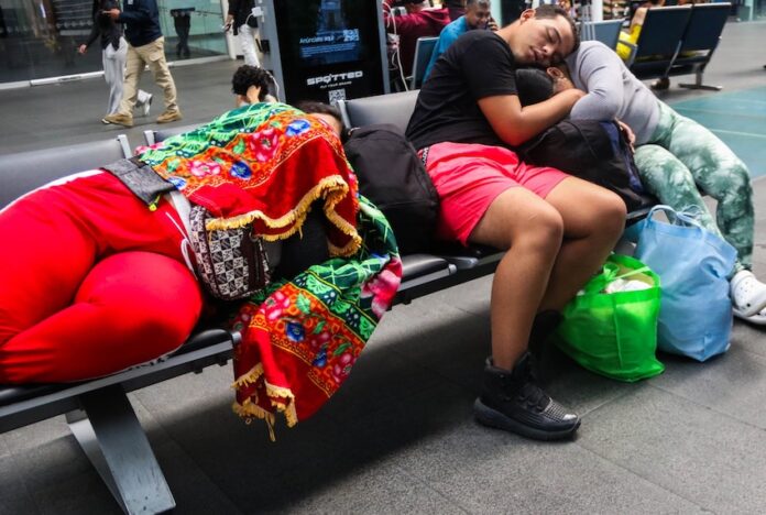 passengers waiting at airport