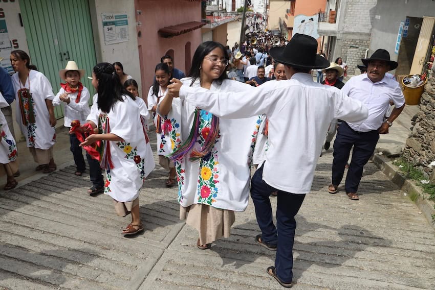 villagers dancing in the street
