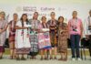 Sheinbaum announcing ApoyArte credit program alongside Indigenous textile artisans