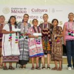 Sheinbaum announcing ApoyArte credit program alongside Indigenous textile artisans