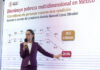 President Sheinbaum gestures at a graph showing a decrease in poverty in Mexico