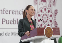 President Sheinbaum at a podium