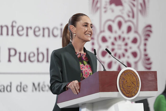 President Sheinbaum at a podium