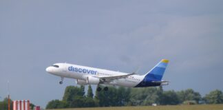 A Discover Airlines plane takes off
