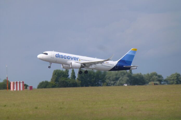 A Discover Airlines plane takes off