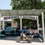 border building in Guatemala with a welcome sign