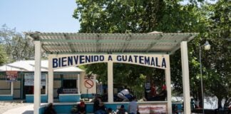 border building in Guatemala with a welcome sign
