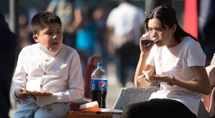 children drinking soda in Mexico
