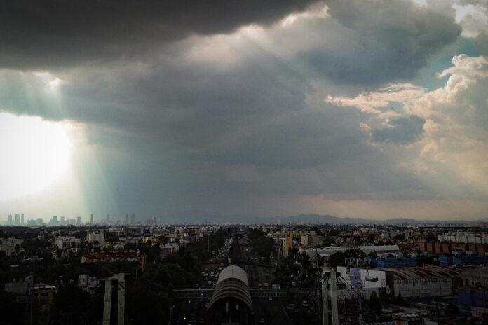 Rain clouds gather over Mexico City