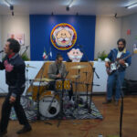 musical group playing in Dr. Simi headquarters