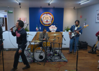 musical group playing in Dr. Simi headquarters