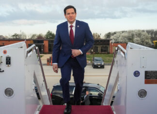 Marco Rubio boarding a plane