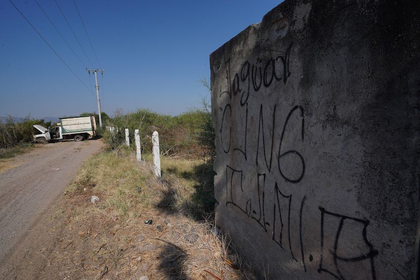 scribbles on a wall that say CJNG (Cartel Jalisco New Generation)