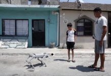 robot dog and two kids