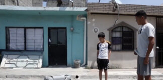 robot dog and two kids