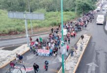Migrants from Cuba, Haiti, Venezuela, Colombia, Peru and African and Central American countries departed Tapachula on foot early Wednesday