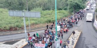 Migrants from Cuba, Haiti, Venezuela, Colombia, Peru and African and Central American countries departed Tapachula on foot early Wednesday