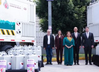 five people standing in a row