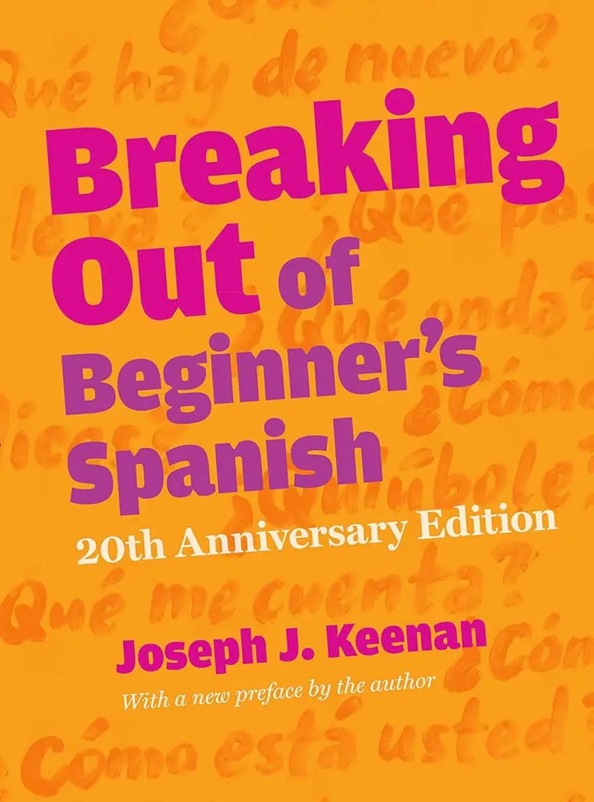 An orange book cover for "Breaking Out of Beginner's Spanish" by Joseph J. Keenan. The title and author are written in near similar shades of purple and pink. It says "20th Anniversary Edition" and "with a preface by the author" in white type.