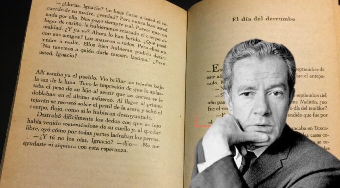 Juan Rulfo in front of a page of his book