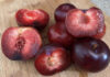 A pile of chopped and seeded plums