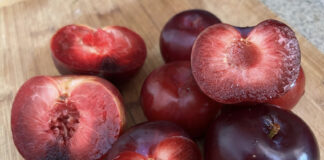 A pile of chopped and seeded plums
