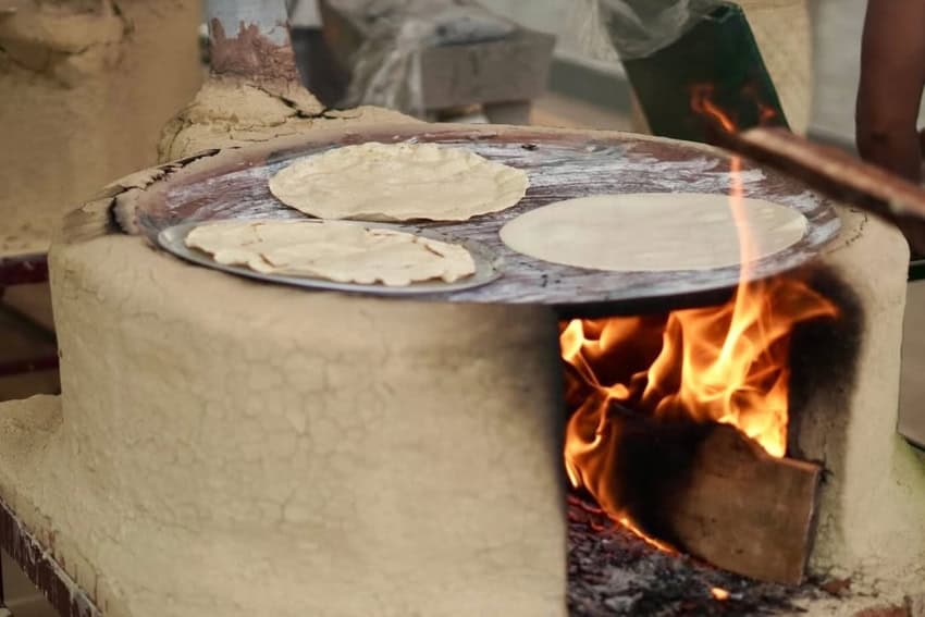 Tlayudas being warmed
