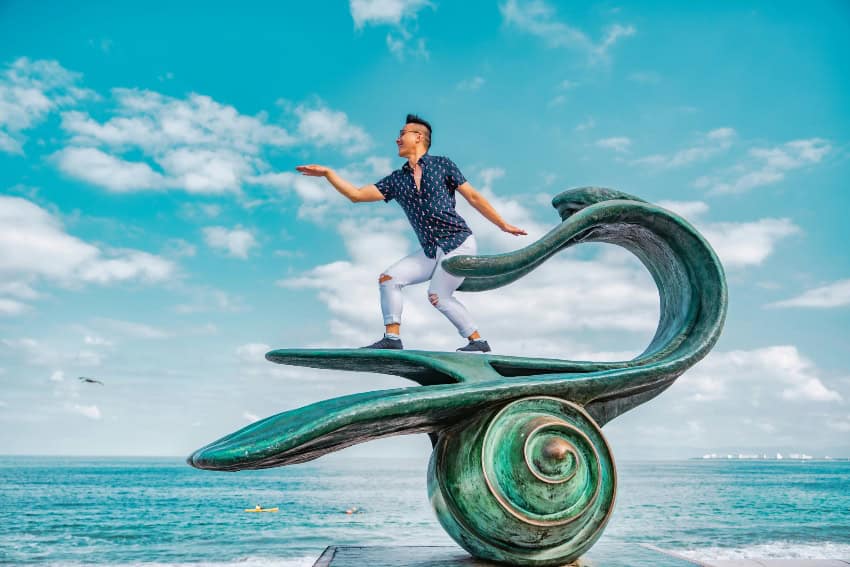Dancing on a statue in Puerto Vallarta