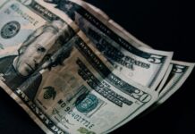 A stack of US dollar bills