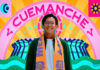 Photo of designer Mario Cortés smiling warmly, wearing glasses and an orange and purple FIFA Mexico City official scarf. The photo is set against a vibrant, stylized graphic background that features his artistic name, "CUEMANCHE," in large pink letters above a colorful sunburst design.