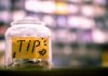 A tip jar on a counter