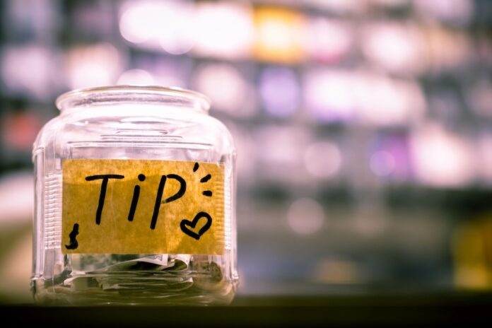A tip jar on a counter