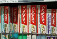 a shelf of toothpaste