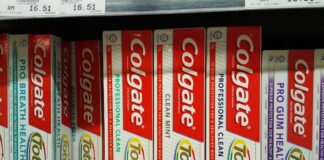 a shelf of toothpaste