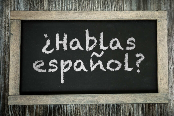A small chalkboard showing the phrase 