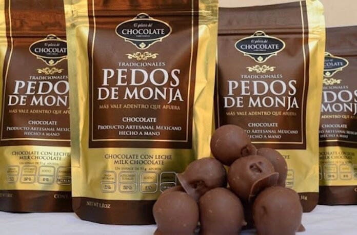 A bag of chocolates labelled 'pedos de monja' or 'nun's farts'