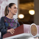 President Sheinbaum at the podium of her daily press conference