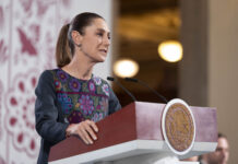 President Sheinbaum at the podium of her daily press conference