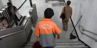 Cleaner working in the Mexico City metro
